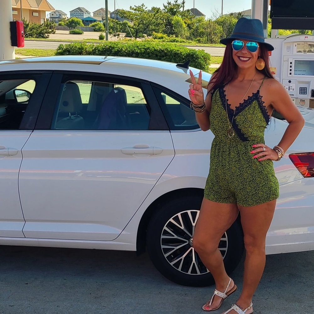 Adorable green and navy romper